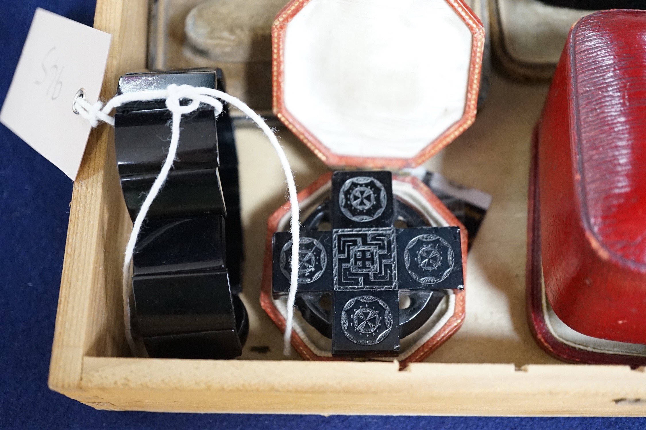 A group of assorted Whitby jet jewellery including three brooches, largest approximately 47mm, three bracelets and a group of French jet? loose pieces.
